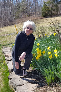 Helen Tyson, cleaning the store in Parrsboro, 2020